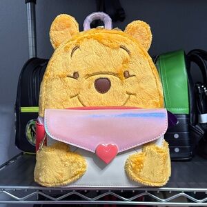 Loungefly Yellow and Pink Winnie Backpack